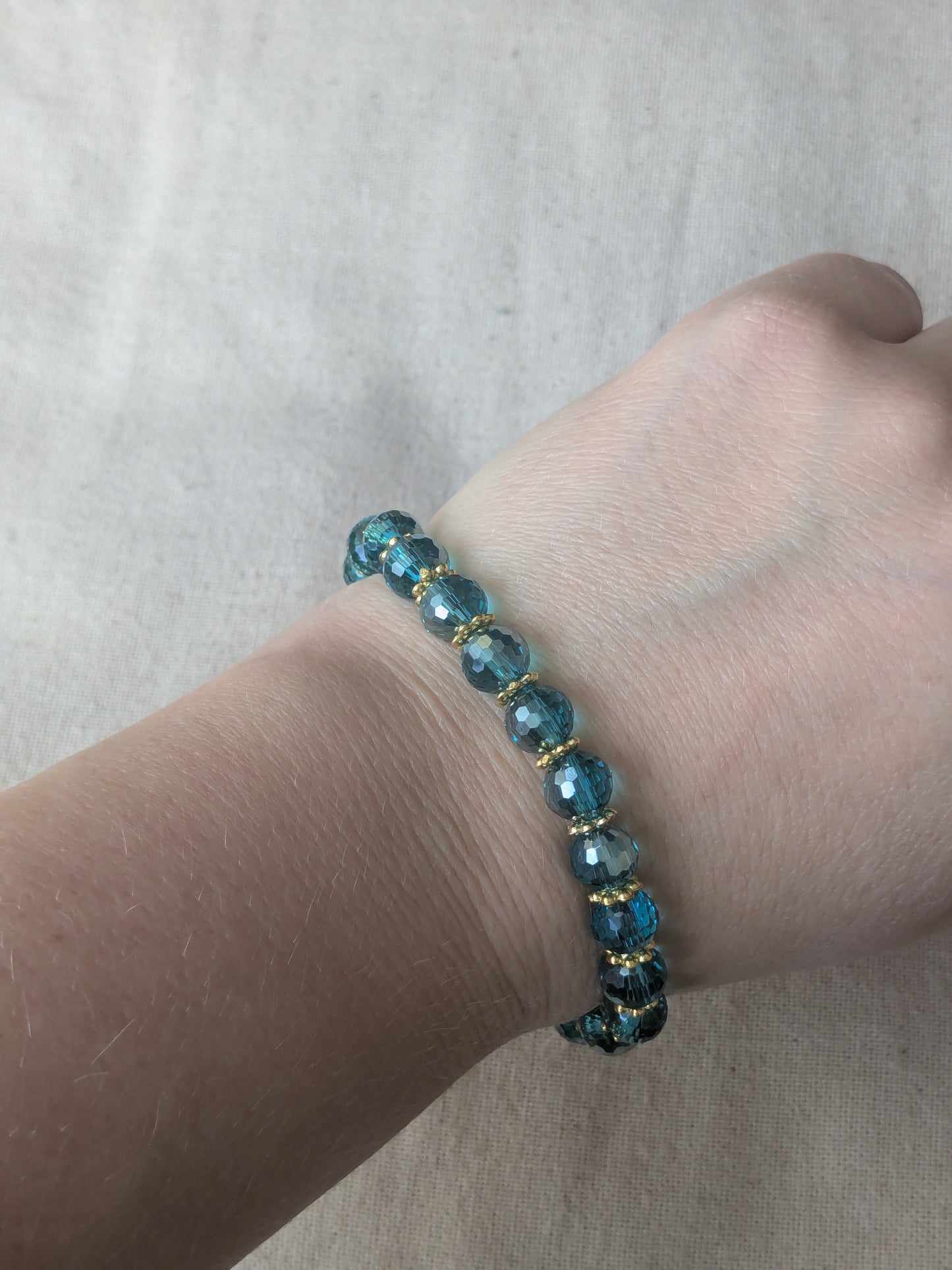 Bracelet perles verre facetté bleu turquoise