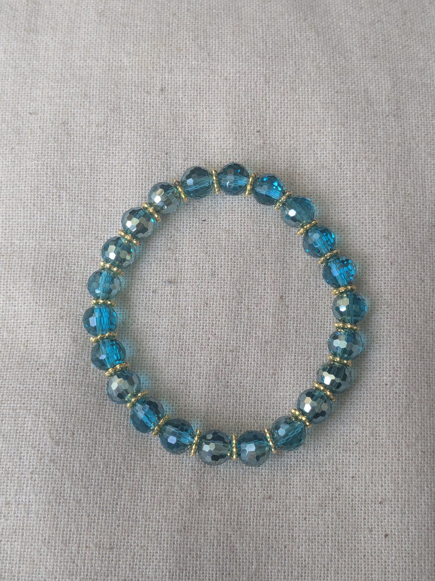 Bracelet perles verre facetté bleu turquoise