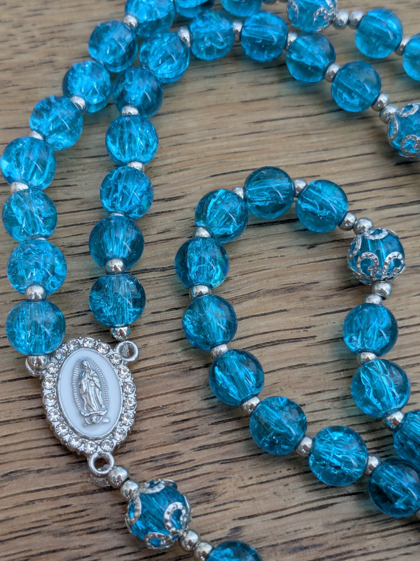 Chapelet en verre bleu turquoise argenté